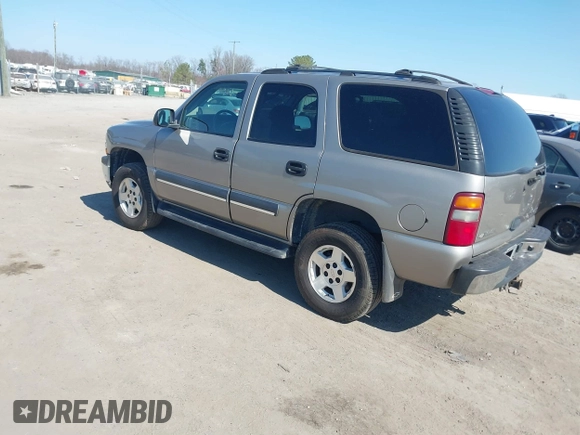 2003 Chevrolet Tahoe LS z VIN 1GNEK13T13J144304, wystawiony jako IAAI lot #41784000 z przebiegiem 363 478 mil mil oraz . Historia ofert i sprzedaży dostępna na DreamBid. Obrazek 3.