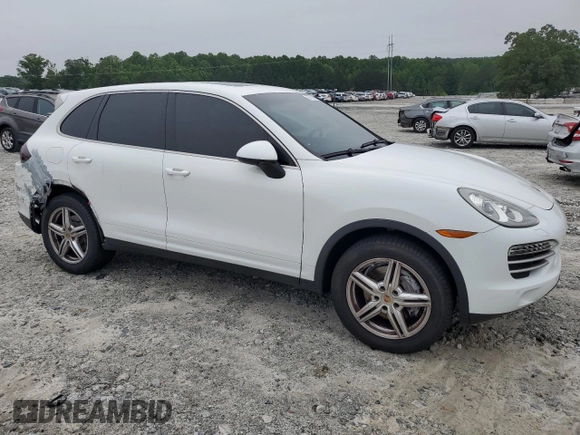 2014 Porsche Cayenne with VIN WP1AA2A21ELA95833, listed as a Copart auction lot 58572195 with 145,073 mi miles and Salvage title. Bid and sale history available at DreamBid. Image 4.