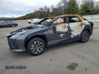 2024 Lexus RZ 450e Premium z VIN JTJAAAAB1RA026330, wystawiony jako Copart lot #73341264 z przebiegiem Nie podano mil oraz Szkody całkowita. Historia ofert i sprzedaży dostępna na DreamBid. Obrazek 1.