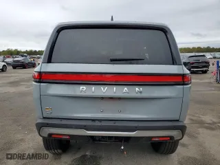 2023 Rivian R1S Adventure with VIN 7PDSGABA4PN011024, listed as a Copart auction lot 72703154 with 14,043 mi miles and Salvage Title. Bid and sale history available at carsss.com. Image 6.