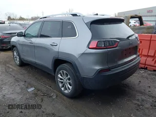 2019 Jeep Cherokee Latitude with VIN 1C4PJLCBXKD247676, listed as a IAAI auction lot 41598599 with 149,815 mi miles. Bid and sale history available at carsss.com. Image 3.