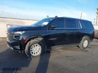 2021 Chevrolet Suburban LT with VIN 1GNSCCKD2MR328577, listed as a IAAI auction lot 41478279 with 128,060 mi miles. Bid and sale history available at carsss.com. Image 6.