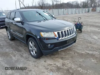 2013 Jeep Grand Cherokee Overland with VIN 1C4RJECG5DC621149, listed as a IAAI auction lot 41255140 with 157,355 mi miles. Bid and sale history available at carsss.com. Image 1.