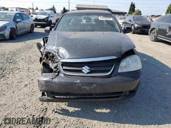 2008 Suzuki Forenza z VIN KL5JD56ZX8K974392, wystawiony jako Copart lot #64694854 z przebiegiem 145 180 mil mil oraz Szkoda całkowita • Salvage title. Historia ofert i sprzedaży dostępna na DreamBid. Obrazek 5.