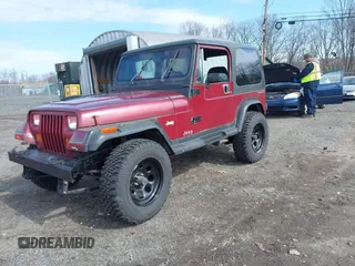 1987 Jeep Wrangler Laredo with VIN 2BCCZ8148HB535575, listed as a IAAI auction lot 41889583 with 221,521 mi miles. Bid and sale history available at carsss.com. Image 2.