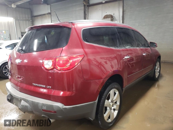 2011 Chevrolet Traverse LTZ with VIN 1GNKVLED9BJ104899, listed as a Copart auction lot 88714025 with 127,808 mi miles and Clean Title. Bid and sale history available at DreamBid. Image 3.