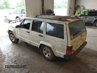 1996 Jeep Cherokee Sport with VIN 1J4FJ68S7TL263437, listed as a IAAI auction lot 42513022 with 158,561 mi miles and . Bid and sale history available at DreamBid. Image 3.