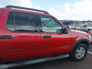 2007 Ford Explorer Sport Trac XLT with VIN 1FMEU31K47UA56890, listed as a IAAI auction lot 42566342 with 210,900 mi miles and . Bid and sale history available at DreamBid. Image 1.