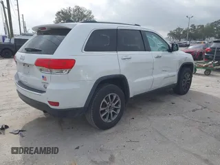 2014 Jeep Grand Cherokee Limited with VIN 1C4RJEBG1EC403972, listed as a IAAI auction lot 41455012 with 241,168 mi miles and . Bid and sale history available at DreamBid. Image 4.