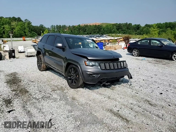 2018 Jeep Grand Cherokee Altitude with VIN 1C4RJEAG4JC145023, listed as a Copart auction lot 59001735 with 127,627 mi miles and Salvage title. Bid and sale history available at DreamBid. Image 14.