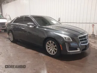 2014 Cadillac CTS Luxury AWD with VIN 1G6AX5S37E0172041, listed as a IAAI auction lot 40343343 with 102,506 mi miles and . Bid and sale history available at DreamBid. Image 1.