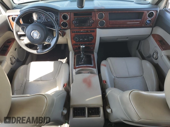 2007 Jeep Commander Limited with VIN 1J8HH58NX7C673663, listed as a Copart auction lot 69526944 with 146,191 mi miles and Salvage title. Bid and sale history available at DreamBid. Image 8.