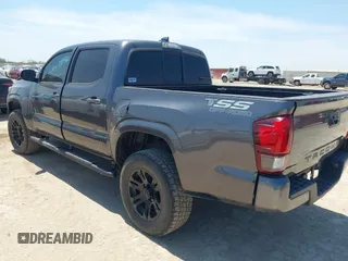 2021 Toyota Tacoma SR with VIN 3TYAX5GN3MT015565, listed as a IAAI auction lot 42241436 with 46,921 mi miles and . Bid and sale history available at DreamBid. Image 3.