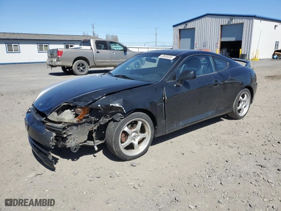 2004 Hyundai Tiburon GT with VIN KMHHN65F94U113699, listed as a Copart auction lot 53858355 with 221,999 mi miles and Salvage Title. Bid and sale history available at carsss.com. Image 1.