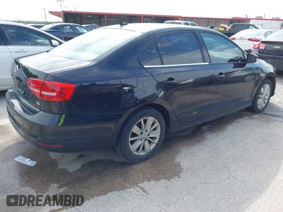 2015 Volkswagen Jetta SE with VIN 3VWD07AJ7FM306911, listed as a IAAI auction lot 42173985 with 143,111 mi miles and . Bid and sale history available at DreamBid. Image 4.