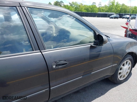 1996 Geo Prizm LSi with VIN 1Y1SK526XTZ026795, listed as a IAAI auction lot 42008701 with 178,017 mi miles. Bid and sale history available at carsss.com. Image 12.