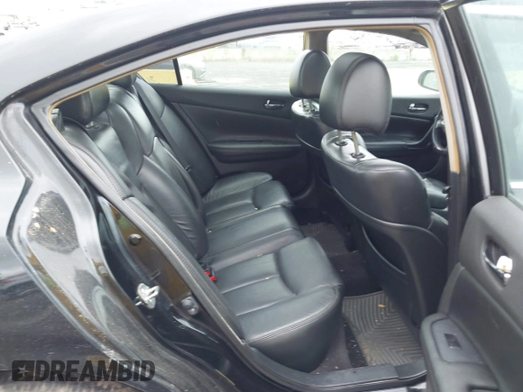 2014 Nissan Maxima SV with VIN 1N4AA5AP7EC490068, listed as a IAAI auction lot 42332173 with 126,323 mi miles and . Bid and sale history available at DreamBid. Image 8.
