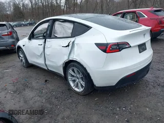 2020 Tesla Model Y Long Range with VIN 5YJYGDEE4LF044843, listed as a IAAI auction lot 41799504 with 40,770 mi miles and . Bid and sale history available at DreamBid. Image 3.
