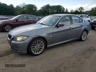 2011 BMW 3 Series 335i xDrive with VIN WBAPL5C57BA920132, listed as a Copart auction lot 61414035 with 94,215 mi miles and Clean title. Bid and sale history available at DreamBid. Image 1.
