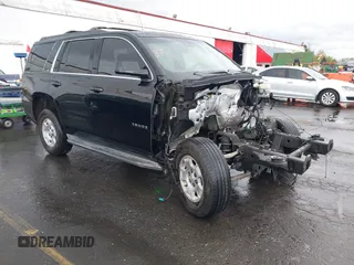 2015 Chevrolet Tahoe LT with VIN 1GNSKBKCXFR171632, listed as a IAAI auction lot 41988593 with Not provided miles and . Bid and sale history available at DreamBid. Image 1.