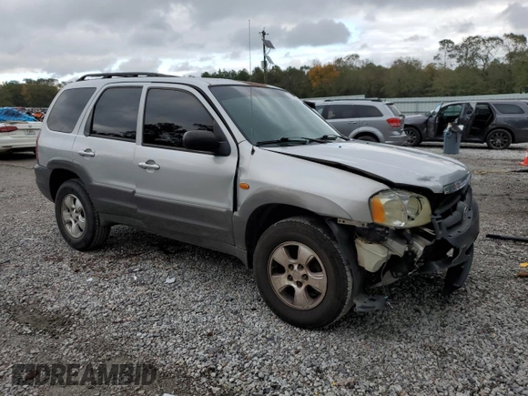 2003 Mazda Tribute LX with VIN 4F2YZ04153KM20941, listed as a Copart auction lot 82683264 with 195,240 mi miles and Salvage Title. Bid and sale history available at DreamBid. Image 4.