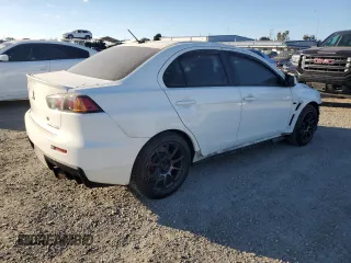 2010 Mitsubishi Lancer Evolution GSR with VIN JA32W8FV1AU007251, listed as a Copart auction lot 89408075 with 90,188 mi miles and Salvage Title. Bid and sale history available at DreamBid. Image 3.