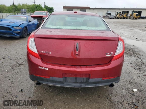 2013 Lincoln MKS EcoBoost with VIN 1LNHL9FTXDG606799, listed as a Copart auction lot 57469995 with 80,168 mi miles and Salvage title. Bid and sale history available at DreamBid. Image 6.
