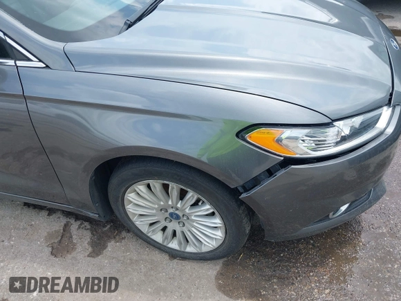 2013 Ford Fusion SE Hybrid with VIN 3FA6P0LU9DR247484, listed as a IAAI auction lot 42110685 with 202,531 mi miles. Bid and sale history available at carsss.com. Image 6.
