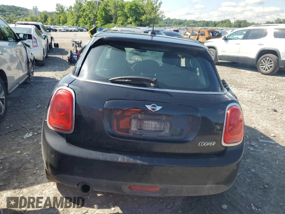 2017 MINI Hardtop 4 Door Cooper с VIN WMWXU1C39H2F92805, выставлен на аукционе Copart как лот 61665635 с пробегом 74 295 миль миль и Списание • Salvage title. История ставок и продаж доступна на DreamBid. Изображение 6.