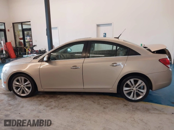 2011 Chevrolet Cruze LTZ with VIN 1G1PH5S9XB7251370, listed as a IAAI auction lot 41984010 with 161,163 mi miles and . Bid and sale history available at DreamBid. Image 14.