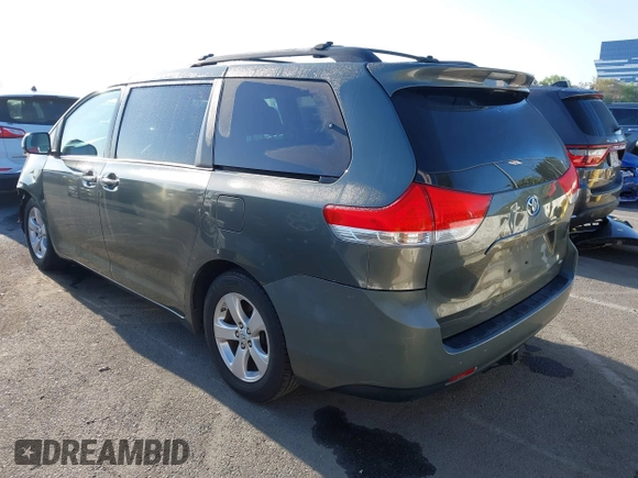 2013 Toyota Sienna LE AAS with VIN 5TDKK3DC0DS313786, listed as a IAAI auction lot 41981268 with 162,423 mi miles. Bid and sale history available at carsss.com. Image 3.