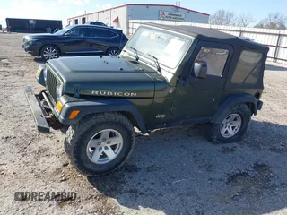 2006 Jeep Wrangler Rubicon z VIN 1J4FA69SX6P788424, wystawiony jako IAAI lot #41712349 z przebiegiem 121 684 mil mil oraz . Historia ofert i sprzedaży dostępna na DreamBid. Obrazek 23.