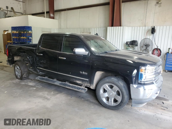 2017 Chevrolet Silverado 1500 LTZ with VIN 3GCPCSEC9HG339738, listed as a Copart auction lot 53599595 with 220,488 mi miles and Salvage Title. Bid and sale history available at DreamBid. Image 4.