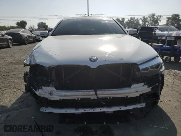 2020 BMW 5 Series 540i z VIN WBAJS1C01LCD37859, wystawiony jako Copart lot #61483155 z przebiegiem 49 087 mil mil oraz Szkoda całkowita • Salvage title. Historia ofert i sprzedaży dostępna na DreamBid. Obrazek 5.