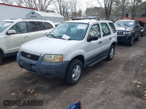 2003 Ford Escape XLS Popular with VIN 1FMYU021X3KC76123, listed as a IAAI auction lot 41844824 with 185,036 mi miles and . Bid and sale history available at DreamBid. Image 2.