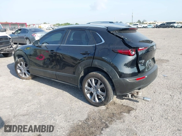 2024 Mazda CX-30 S Preferred with VIN 3MVDMBCM0RM669099, listed as a IAAI auction lot 41864473 with 6,278 mi miles and . Bid and sale history available at DreamBid. Image 3.