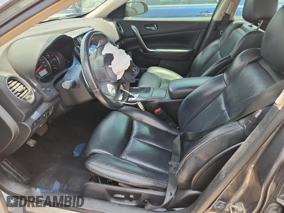 2014 Nissan Maxima SV with VIN 1N4AA5AP8EC458598, listed as a Copart auction lot 58099025 with 147,083 mi miles and Salvage title. Bid and sale history available at DreamBid. Image 7.