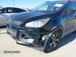 2016 Ford Escape SE with VIN 1FMCU0G99GUC19883, listed as a IAAI auction lot 41726858 with 156,863 mi miles. Bid and sale history available at carsss.com. Image 6.