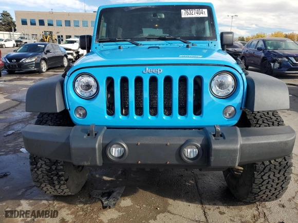 2017 Jeep Wrangler Unlimited Rubicon with VIN 1C4BJWFGXHL584088, listed as a Copart auction lot 76327404 with 127,483 mi miles and Salvage Title. Bid and sale history available at carsss.com. Image 5.