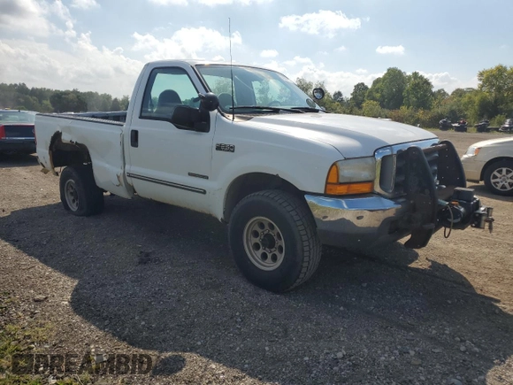 1999 Ford Super Duty F-250 XL with VIN 1FTNF21F8XED38956, listed as a Copart auction lot 69384214 with 143,127 mi miles and Salvage Title. Bid and sale history available at carsss.com. Image 4.