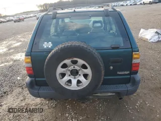 1999 Isuzu Rodeo S with VIN 4S2CK58W2X4312468, listed as a Copart auction lot 85753294 with Not Provided miles and Salvage Title. Bid and sale history available at DreamBid. Image 6.
