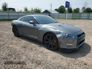 2009 Nissan GT-R Premium z VIN JN1AR54F09M251146, wystawiony jako Copart lot #68059054 z przebiegiem 16 498 mil mil oraz Szkody całkowita. Historia ofert i sprzedaży dostępna na DreamBid. Obrazek 4.