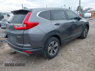 2017 Honda CR-V LX with VIN 2HKRW6H39HH210702, listed as a IAAI auction lot 41859435 with 126,532 mi miles. Bid and sale history available at carsss.com. Image 4.