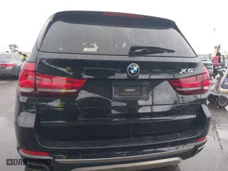 2018 BMW X5 xDrive40e iPerformance with VIN 5UXKT0C54J0V99573, listed as a IAAI auction lot 41490567 with 50,650 mi miles. Bid and sale history available at carsss.com. Image 17.
