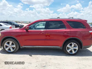 2013 Dodge Durango SXT with VIN 1C4RDHAG6DC683865, listed as a IAAI auction lot 42615546 with 113,545 mi miles and . Bid and sale history available at DreamBid. Image 14.