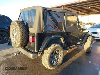 1997 Jeep Wrangler SE with VIN 1J4FY29P0VP415195, listed as a IAAI auction lot 41221078 with 137,046 mi miles. Bid and sale history available at carsss.com. Image 4.
