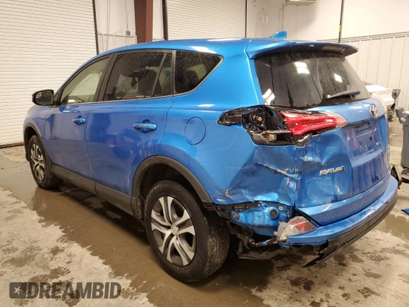 2018 Toyota RAV4 LE with VIN JTMBFREV9JJ197097, listed as a Copart auction lot 50042325 with 167,978 mi miles and Salvage Title. Bid and sale history available at DreamBid. Image 2.
