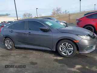 2017 Honda Civic Sedan LX with VIN 19XFC2F59HE204377, listed as a IAAI auction lot 41706604 with 160,114 mi miles. Bid and sale history available at carsss.com. Image 14.