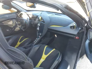 2019 McLaren 720S z VIN SBM14DCAXKW002639, wystawiony jako IAAI lot #41707749 z przebiegiem 59 720 mil mil oraz . Historia ofert i sprzedaży dostępna na DreamBid. Obrazek 5.
