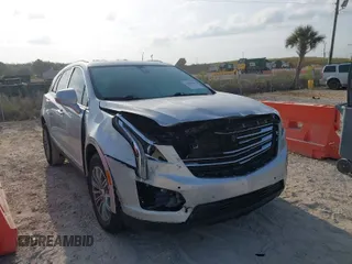 2017 Cadillac XT5 Luxury FWD with VIN 1GYKNBRS8HZ205769, listed as a IAAI auction lot 41865624 with 112,767 mi miles. Bid and sale history available at carsss.com. Image 1.